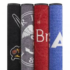 Asortiman gotovih urolanih perivih otiraca sa natpisom i logom Notrax Logo Washable